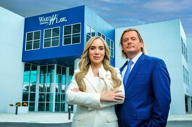 Cuban-American attorney Jany Martinez-Ward with her husband, attorney Gregory Ward, at the offices of The Ward Law Group in Miami Lakes. The law firm specializes in representing accident victims, particularly Hispanics and immigrants.